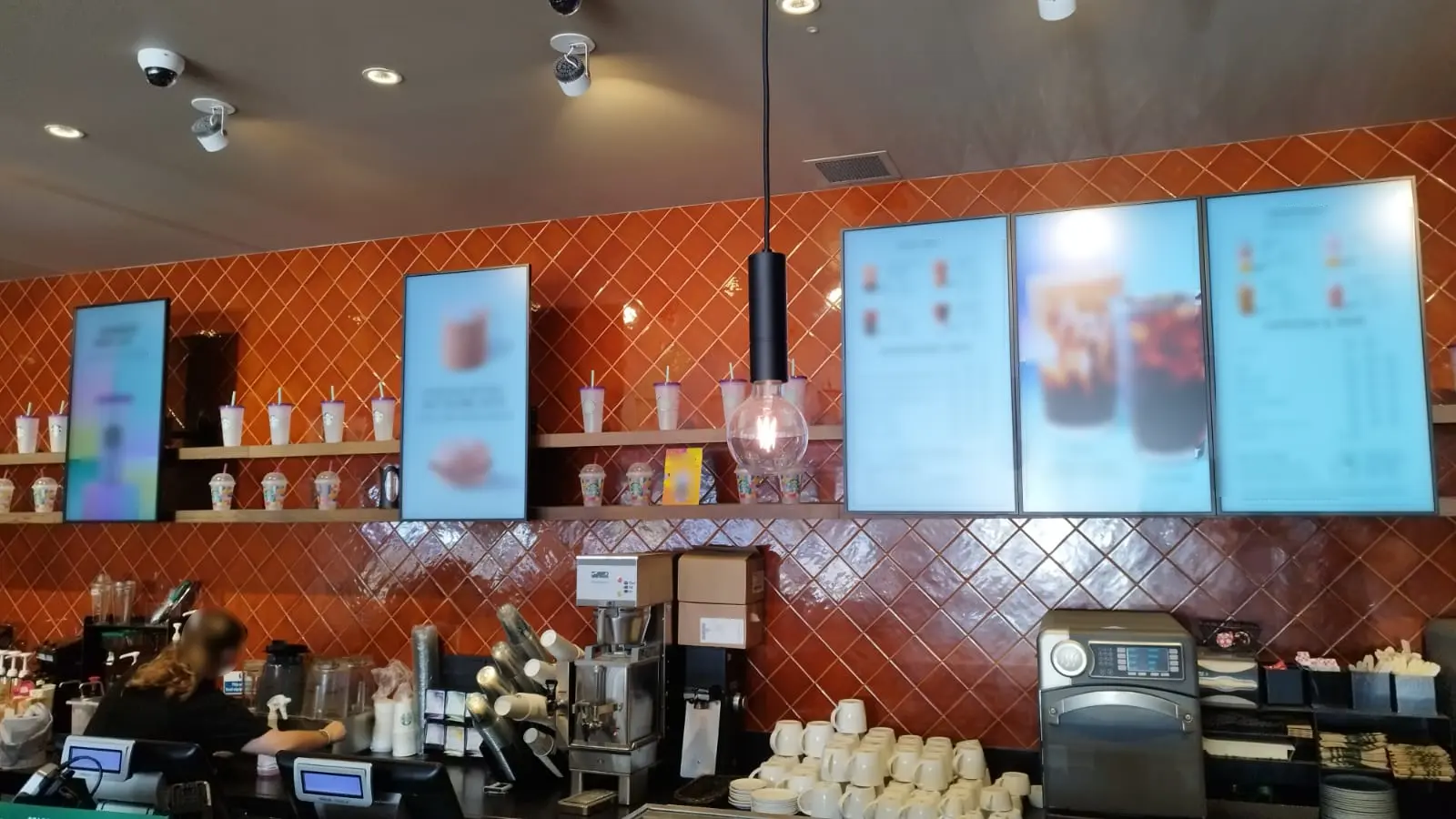Digital menu boards installed in a live customer venue