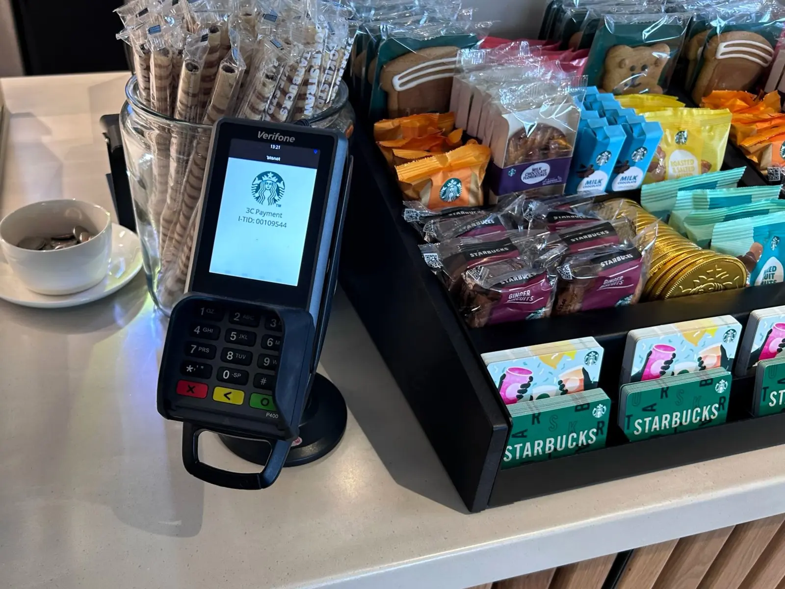 A point-of-sale terminal installed in a Starbucks retail environment