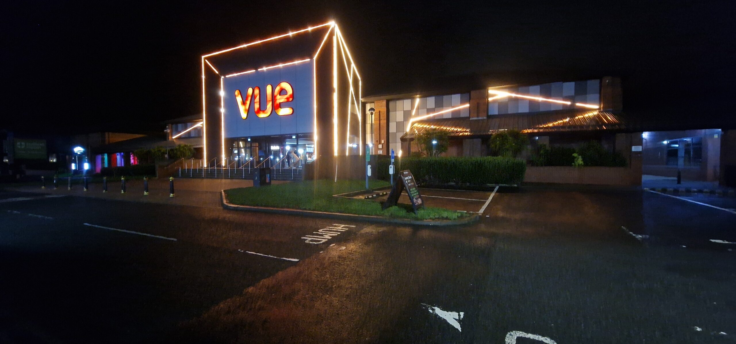 Vue cinema exterior illuminated at night, from the AD Systems project gallery