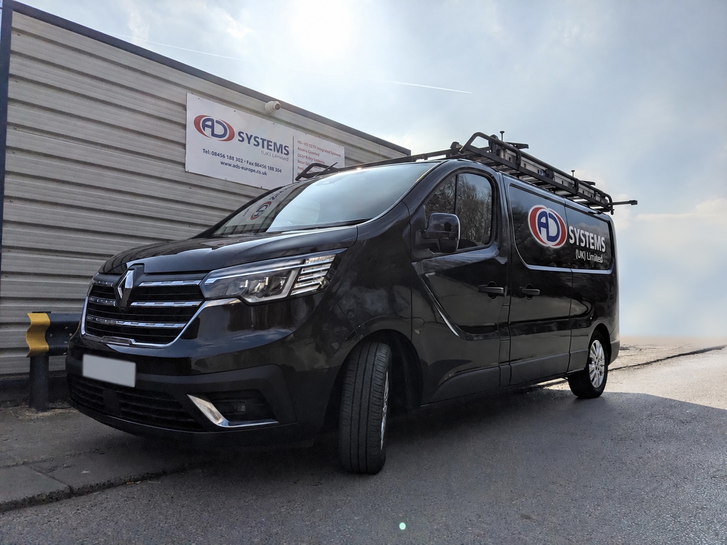 An AD Systems engineering vehicle outside the company office, shown with digitally added AD livery